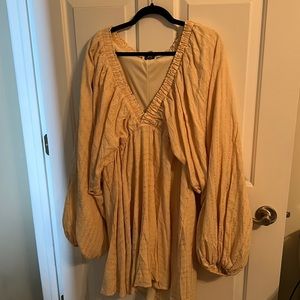 Yellow in the style long sleeve dress.